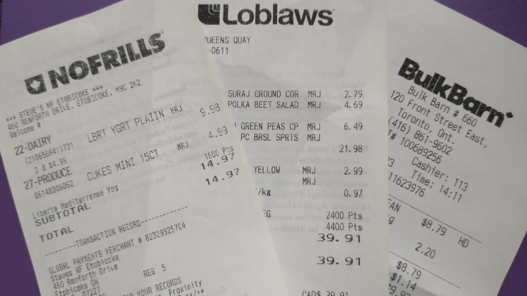 Three grocery store receipts