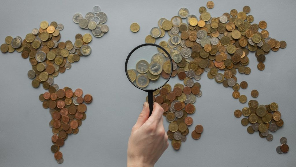 world map made out of coins